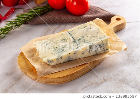 Tasty Italian gorgonzola cheese over board Tasty Italian gorgonzola cheese over board 138993587