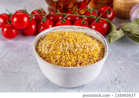 Raw dry bulgur wheat cereal Raw dry bulgur wheat cereal 138993637