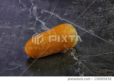 Ripe juicy yellow carrots roots Ripe juicy yellow carrots roots 138993638