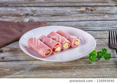 Wrapped ham and cheese roll 138993640