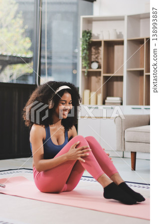 Women exercising in fitness studio yoga classes 138993887