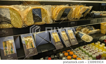 Sandwiches and drinks displayed in the showcase at Cafe Nero Sandwiches and drinks displayed in the showcase at Cafe Nero 138993914