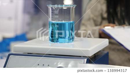 Sciene laboratory. Close up of Modern laboratory scenes with glassware tube reactors and colorful liquids in testing and analysis processes. Chemistry research pharmaceuticals biotechnology concepts. 138994317
