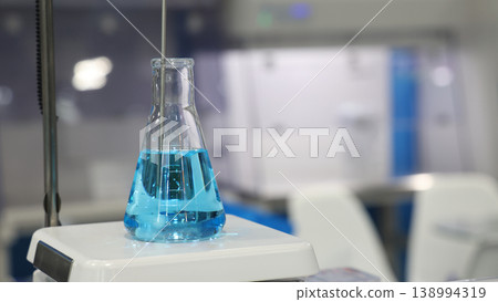 Sciene laboratory. Close up of Modern laboratory scenes with glassware tube reactors and colorful liquids in testing and analysis processes. Chemistry research pharmaceuticals biotechnology concepts. 138994319