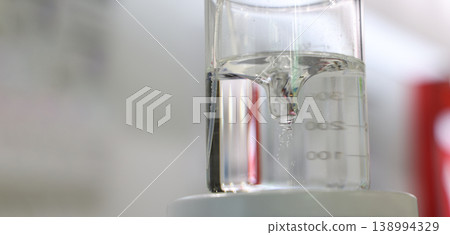 Sciene laboratory. Close up of Modern laboratory scenes with glassware tube reactors and colorful liquids in testing and analysis processes. Chemistry research pharmaceuticals biotechnology concepts. 138994329