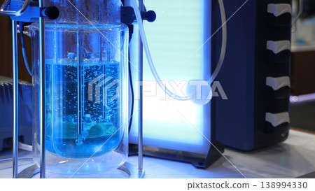 Sciene laboratory. Close up of Modern laboratory scenes with glassware tube reactors and colorful liquids in testing and analysis processes. Chemistry research pharmaceuticals biotechnology concepts. 138994330