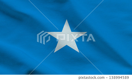 Sovereignty symbolized in the blue and white flag of Somalia waving gently in the breeze 138994589