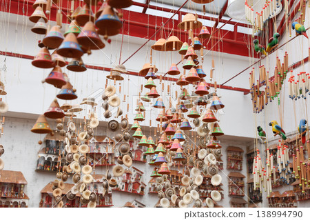 Beautiful handmade wind chimes made of clay at the small town of Raquira also known as The City of Pots in Colombia 138994790