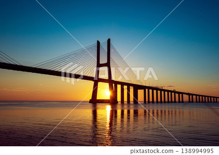 Vasco da Gamma road bridge in Portuguese capital Lisbon at sunrise. 138994995
