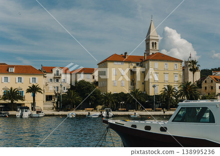 Amazing view of yacht marina and old town Supetar, Brah island, Croatia. Beautiful sunny day. 138995236
