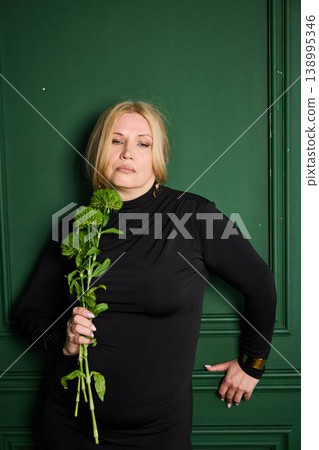 Poised Female Subject Exhibiting Confidence and Simple Elegance Poised Female Subject Exhibiting Confidence and Simple Elegance 138995346