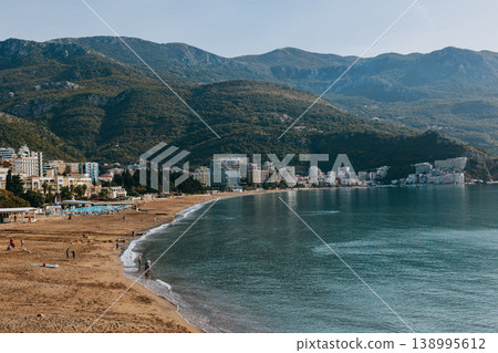 Amazing view of the Adriatic sea and a beach in Becici near Budva. Travel destination in Montenegro. Amazing view of the Adriatic sea and a beach in Becici near Budva. Travel destination in Montenegro. 138995612