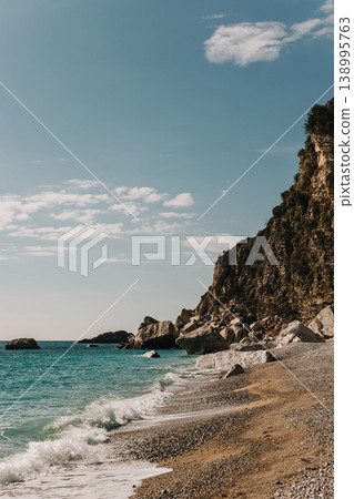 AAmazing view of the Adriatic sea and mountains near Petrovac, Montenegro. Travel destination in Montenegro. AAmazing view of the Adriatic sea and mountains near Petrovac, Montenegro. Travel destination in Montenegro. 138995763