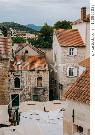 Amazing view of buildings and roofs in Trogir old town. Travel destination in Croatia. Amazing view of buildings and roofs in Trogir old town. Travel destination in Croatia. 138995885