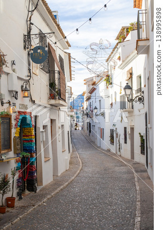 Exploring the charming historic white washed streets of Altea Spain, a beautiful destination for family holidays and memorable travel experiences on a bright day 138995898