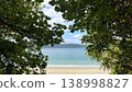 Yadori Beach on Amami Oshima Island: A breathtaking landscape of blue ocean and lush green islands. 138998827
