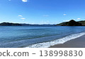Yadori Beach on Amami Oshima Island: A breathtaking landscape of blue ocean and lush green islands. 138998830