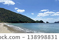 Yadori Beach on Amami Oshima Island: A breathtaking landscape of blue ocean and lush green islands. 138998831