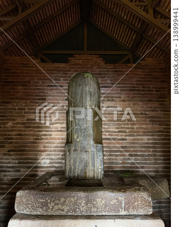 Ancient Stone Shiva Lingam in a Brick Temple Sanctuary Ancient Stone Shiva Lingam in a Brick Temple Sanctuary 138999441