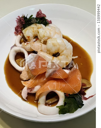 Fresh Mixed Seafood Platter with Salmon Sashimi, Shrimp and Squid in Savory Sauce Fresh Mixed Seafood Platter with Salmon Sashimi, Shrimp and Squid in Savory Sauce 138999442