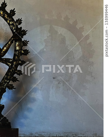 Lord Shiva Nataraja Statue Casting Dramatic Shadow on Textured Wall Lord Shiva Nataraja Statue Casting Dramatic Shadow on Textured Wall 138999446
