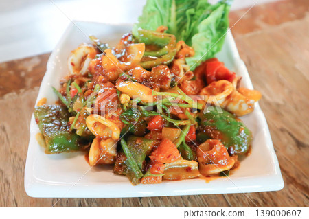 stir fried squid or stir fried spicy squid with sweet pepper and onion or spicy squid stir fried squid or stir fried spicy squid with sweet pepper and onion or spicy squid 139000607