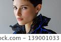 Fashion portrait young woman short hair studio beauty close up blue eyes black ruffle clothing, confident female model posing studio light with dramatic collar and minimal background 139001033