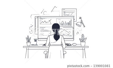 Businesswoman analyzing data on computer at desk Businesswoman analyzing data on computer at desk 139001081