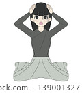 A woman clutches her head in despair, appearing overwhelmed by failure, shock, and stress. 139001327