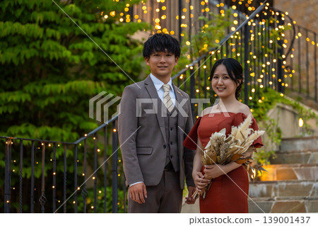 Bride and groom in colored dresses, night wedding, wedding image 139001437