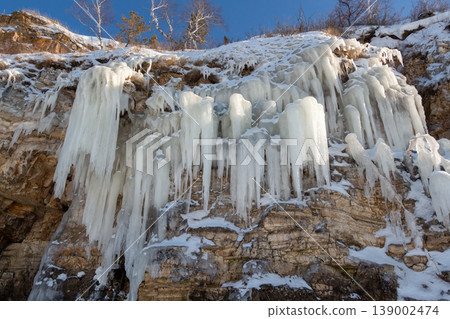 Icicles on the rocks 139002474