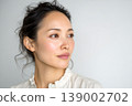 The profile of a beautiful middle-aged woman 139002702