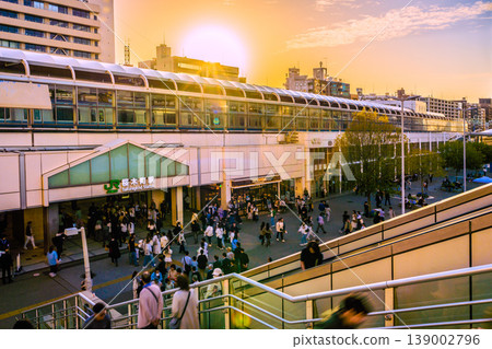 New cityscape of Yokohama, Japan, April 18th. A view of Sakuragicho Station and trains illuminated by the setting sun. New cityscape of Yokohama, Japan, April 18th. A view of Sakuragicho Station and trains illuminated by the setting sun. 139002796