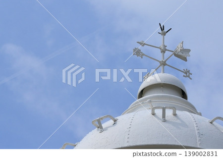 Wind vane at the top of the lighthouse 139002831