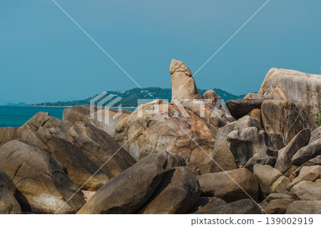 Hin Ta Grandfather Rock formation on Koh Samui island, iconic granite landmark near Lamai beach with tropical sea and distant coastline 139002919