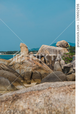 Famous Hin Ta Grandfather Rock formation on Koh Samui with distinctive granite shapes above tropical sea and distant coastline near Lamai beach Famous Hin Ta Grandfather Rock formation on Koh Samui with distinctive granite shapes above tropical sea and distant coastline near Lamai beach 139002936