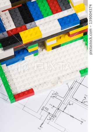 Electrical diagrams of house with building under construction made of blocks 139004374