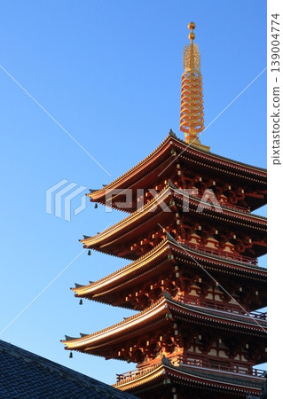 The five-story pagoda at Sensoji Temple glowing in the setting sun The five-story pagoda at Sensoji Temple glowing in the setting sun 139004774