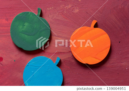 Colorful apples against a red background 139004951