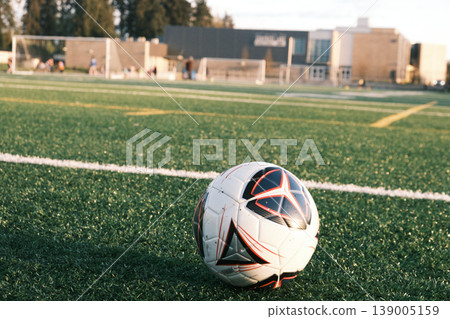 A close-up of a soccer ball on a soccer field. Soccer concept. A close-up of a soccer ball on a soccer field. Soccer concept. 139005159