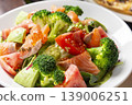 A photo of a healthy seafood salad with salmon, salmon roe, and avocado. 139006251