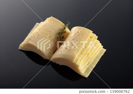 Cheese slices folded like an open book. Cheese slices folded like an open book. 139006762