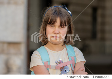 Child with backpack in city represents education development and school life Child with backpack in city represents education development and school life 139006848