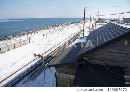A seaside town with lingering winter snow A seaside town with lingering winter snow 139007073