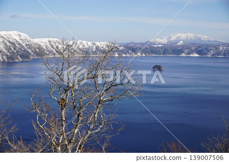 Lake Mashu on a clear winter day Lake Mashu on a clear winter day 139007506