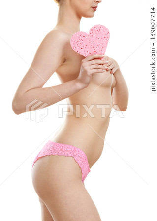 Sensual naked woman with beautiful figure perfect skin holding pink heart shaped bath sponge in hands 139007714