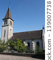 Catholic church in European Murten town in Switzerland - vertical 139007738