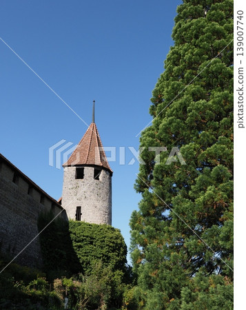 Medieval tower in European Murten town in Switzerland - vertical Medieval tower in European Murten town in Switzerland - vertical 139007740