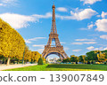 An amazing view of the Eiffel Tower beneath cloudy skies from the Champ de Mars, Paris, France 139007849