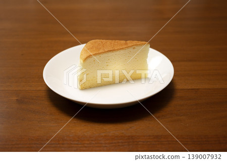 A single slice of soufflé cheesecake on a plate A single slice of soufflé cheesecake on a plate 139007932